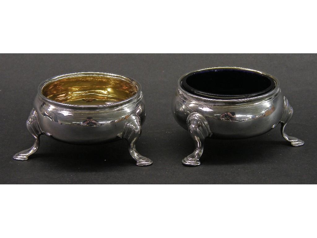 Appraisal: Pair of George III silver circular table salts with gilded