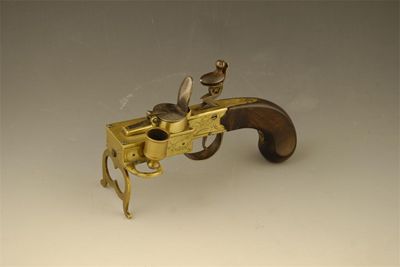 Appraisal: A th century brass pistol tinder box with a rosewood