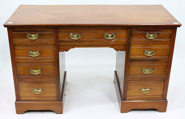 Appraisal: A LATE VICTORIAN WALNUT PEDESTAL DESK cm wide x cm