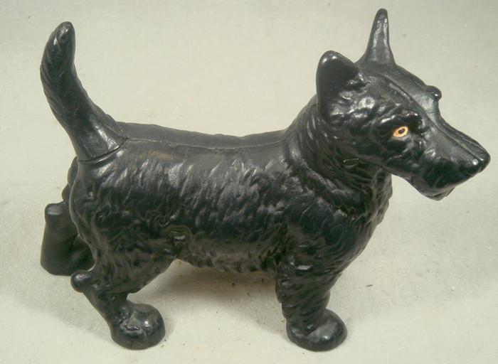 Appraisal: Cast iron doorstop free standing black Schnauzer number stamped on