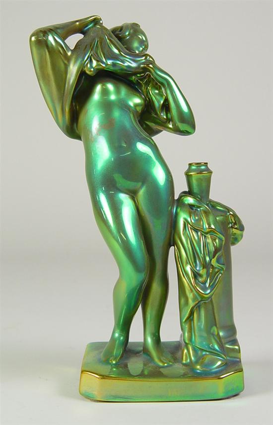 Appraisal: Zsolnay Woman with Water Jar Green and gold iridescent nude