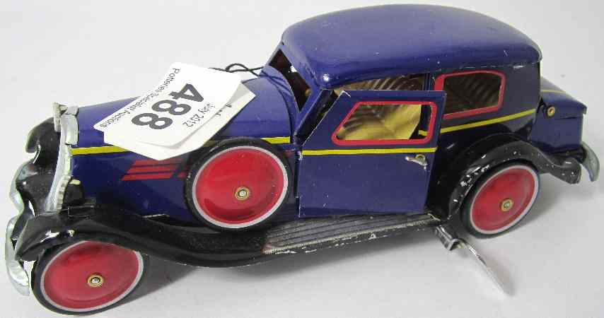 Appraisal: Paya Saloon Clockwork tin plate car Reproduction