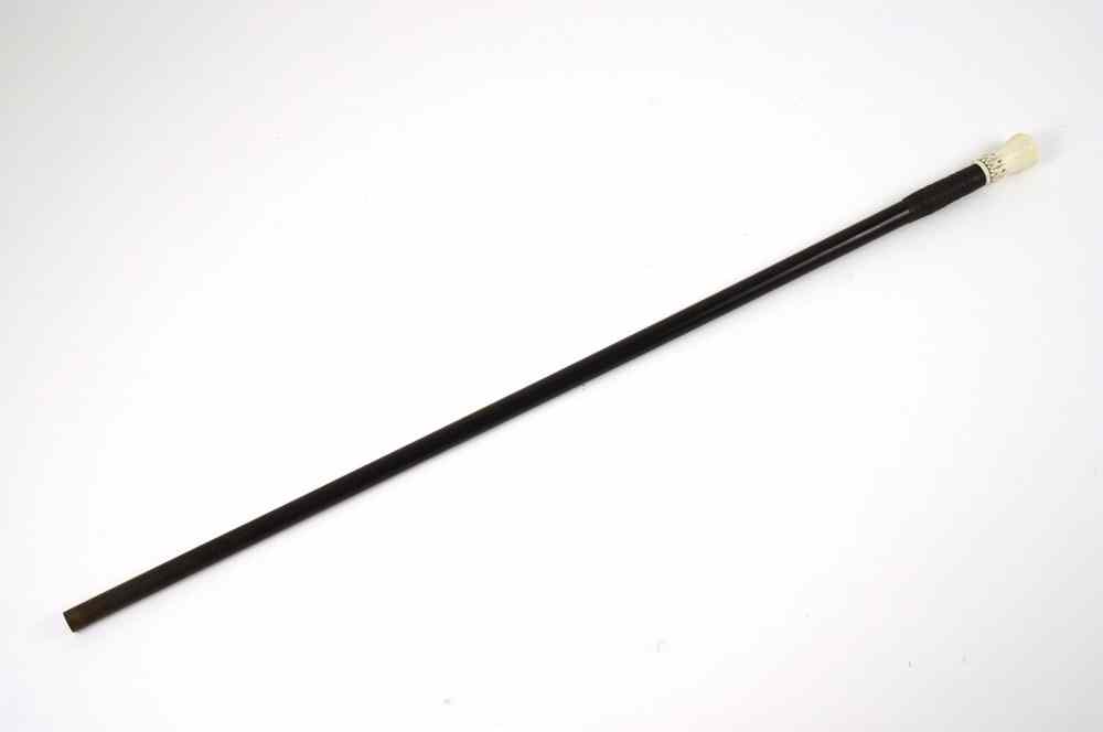 Appraisal: SWORD CANE - th c ebony cane with ivory top