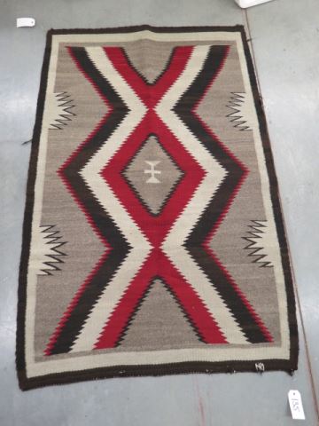 Appraisal: Navajo Indian Rug eye dazzling style criss-cross sawtooth design x