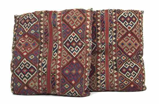 Appraisal: A Pair of Kilim Wool Upholstered Cushions having allover repeating