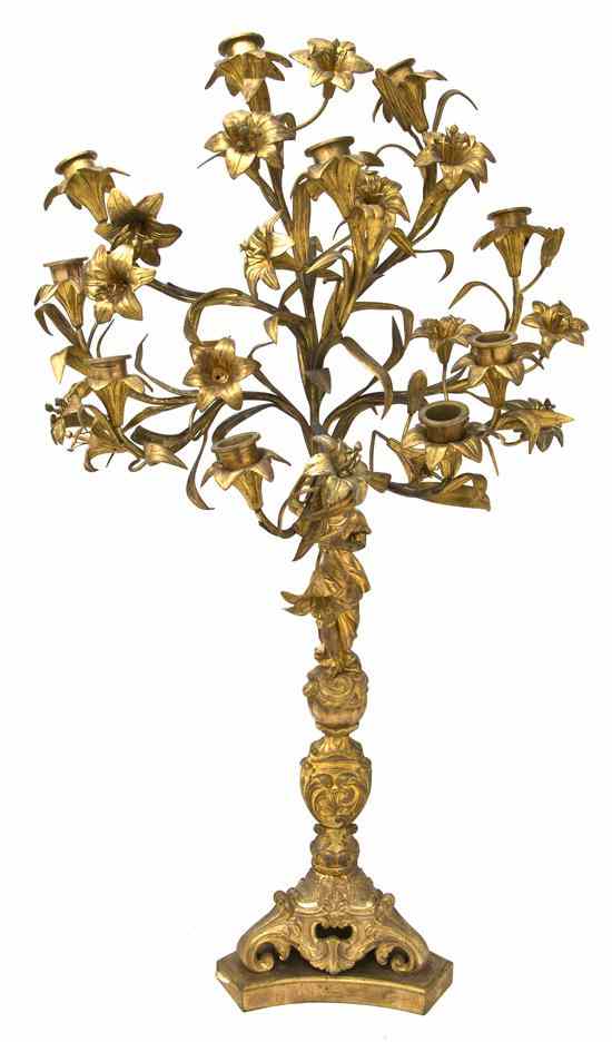 Appraisal: A Continental Cast Metal Figural Ten-Light Candelabrum cast as a