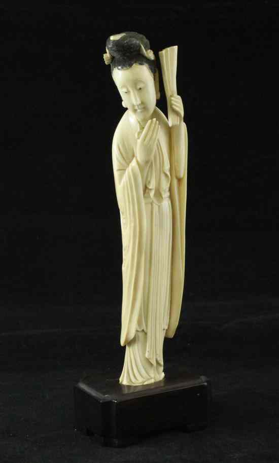 Appraisal: A Chinese ivory figure of a lady early th century