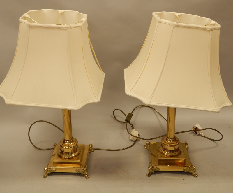 Appraisal: A pair of modern brass lamp bases each with paw