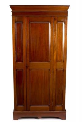 Appraisal: A mahogany wardrobe with central panel door cm wide