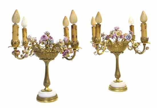 Appraisal: A Pair of French Gilt Metal and Porcelain Four-Light Candelabra