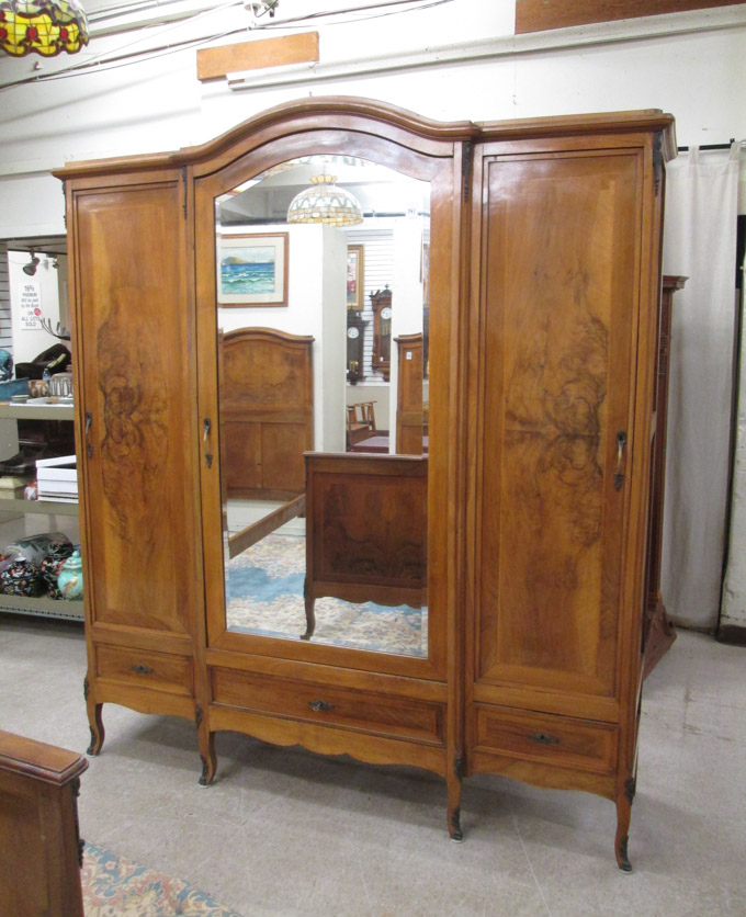 Appraisal: LOUIS XV STYLE THREE-DOOR WARDROBE Continental c walnut and burl