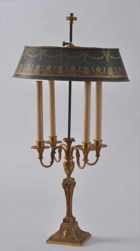 Appraisal: LOUIS XVI STYLE GILT-METAL FOUR-LIGHT CANDELABRA LAMP The stem with