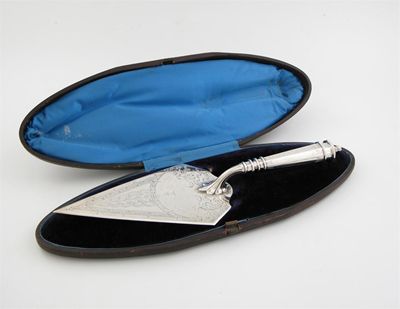 Appraisal: A Victorian engraved presentation trowel in a fitted case inscribed