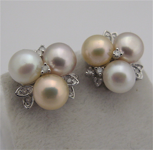 Appraisal: PAIR OF PEARL DIAMOND AND KARAT GOLD EARRINGS each white