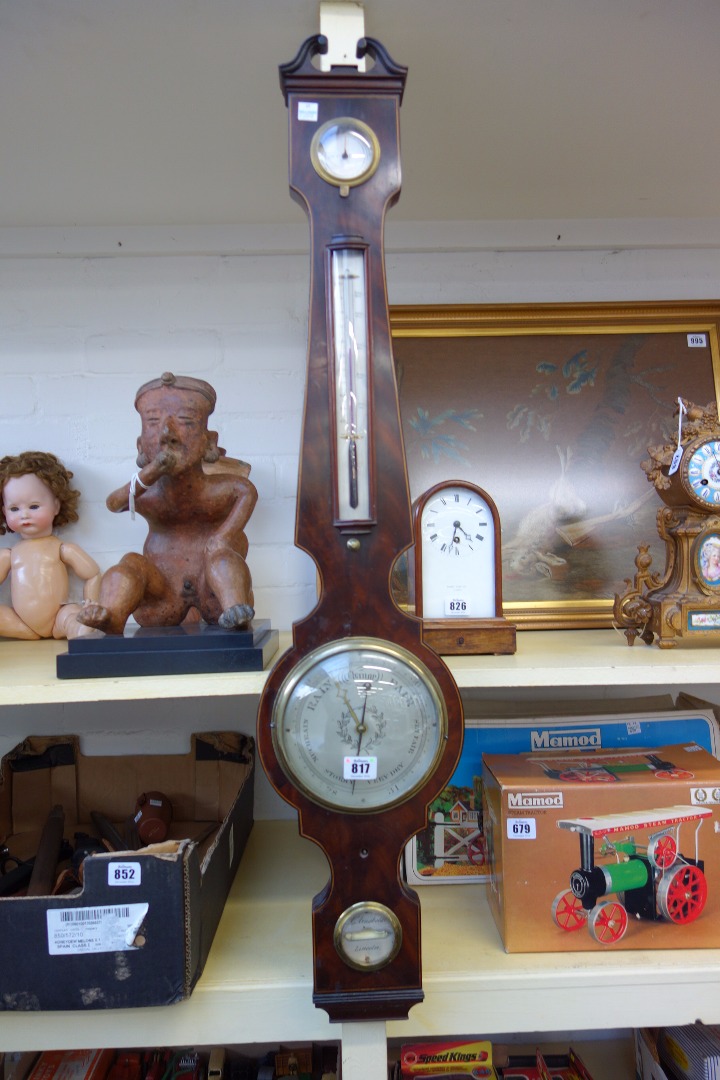 Appraisal: A Regency mahogany cased wheel barometer and thermometer by L