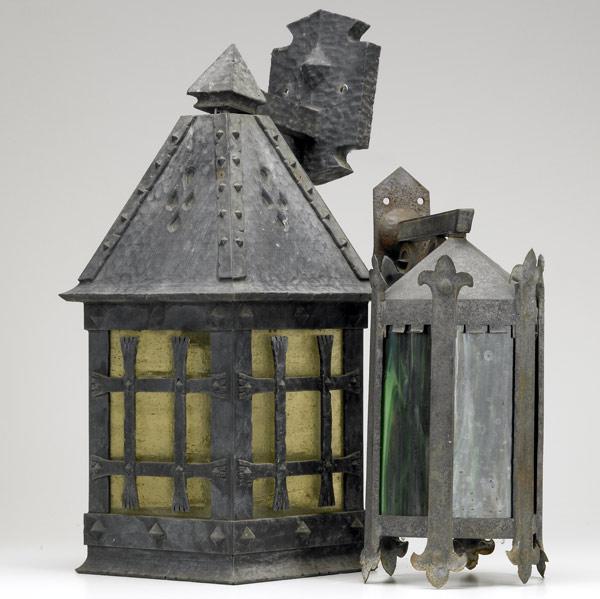 Appraisal: GOTHIC Two exterior lanterns lined in glass Complete with wall