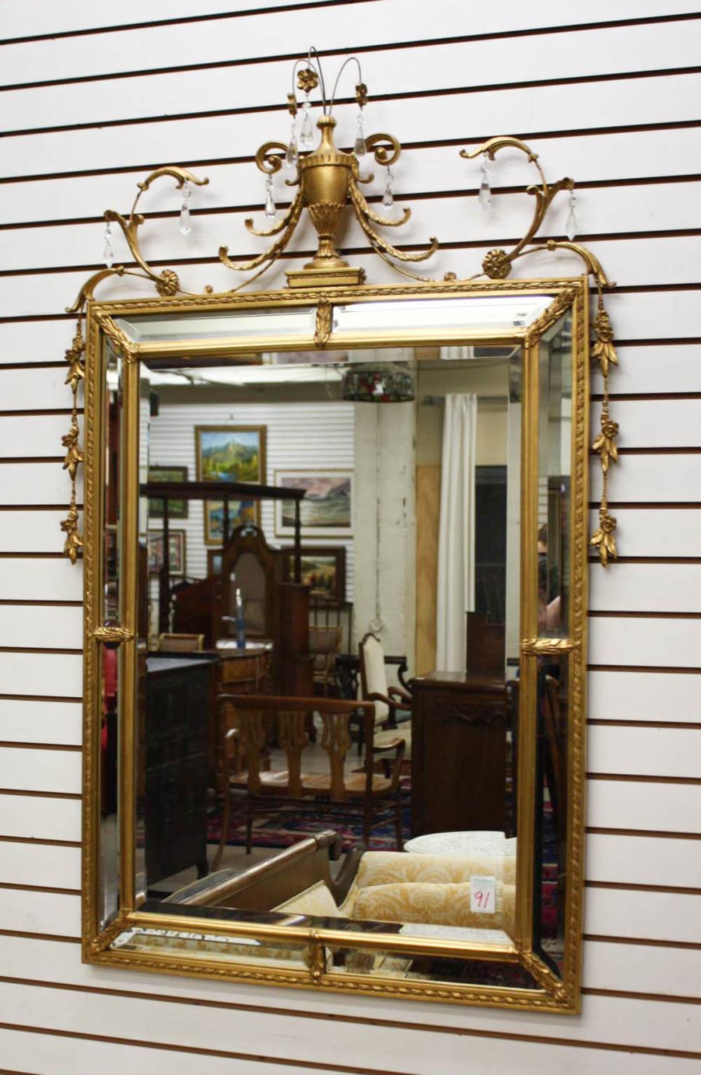 Appraisal: NEOCLASSICAL STYLE GILTWOOD FRAMED WALL MIRROR Adamesque design by Carvers'