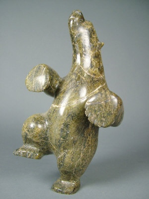 Appraisal: An Inuit soapstone carving of a standing dancing bear height