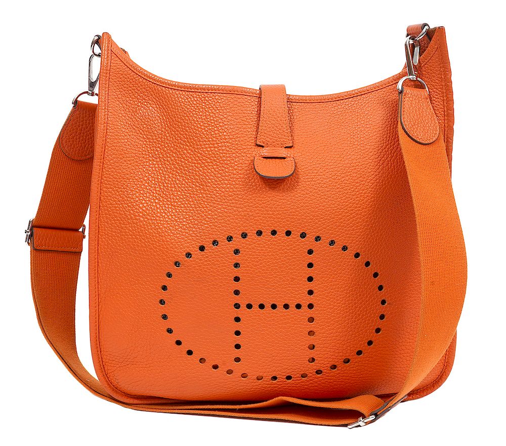 Appraisal: Hermes Orange Clemence Evelyne III GM Hermes Orange Clemence Evelyn