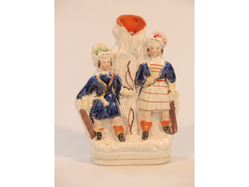 Appraisal: An thC Staffordshire figural spill vase of Hunters in underglaze