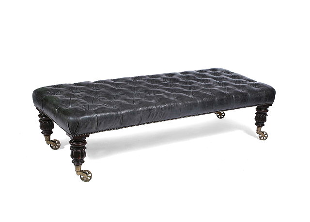 Appraisal: A BLACK LEATHER BUTTON UPHOLSTERED LONG LOW RECTANGULAR STOOL with