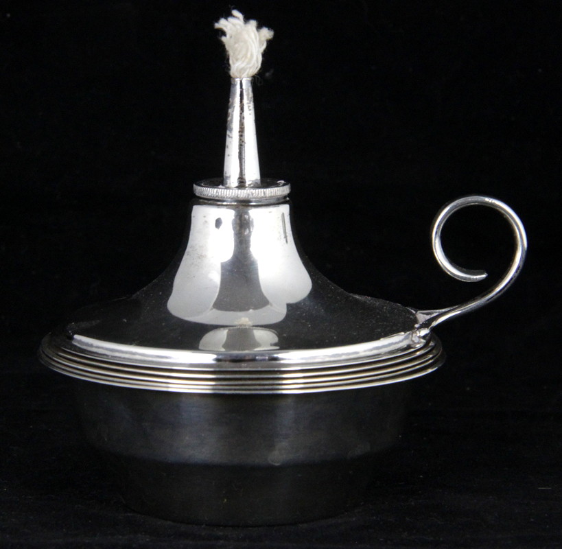 Appraisal: A silver cigar lighter modelled as an oil lamp Asprey