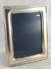 Appraisal: A silver faced photo frame x cm