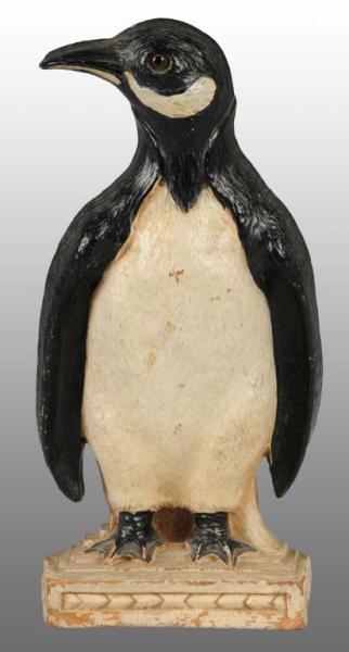 Appraisal: Penguin Doorstop Description Marked Syroco Wood Syracuse NY Spring steel