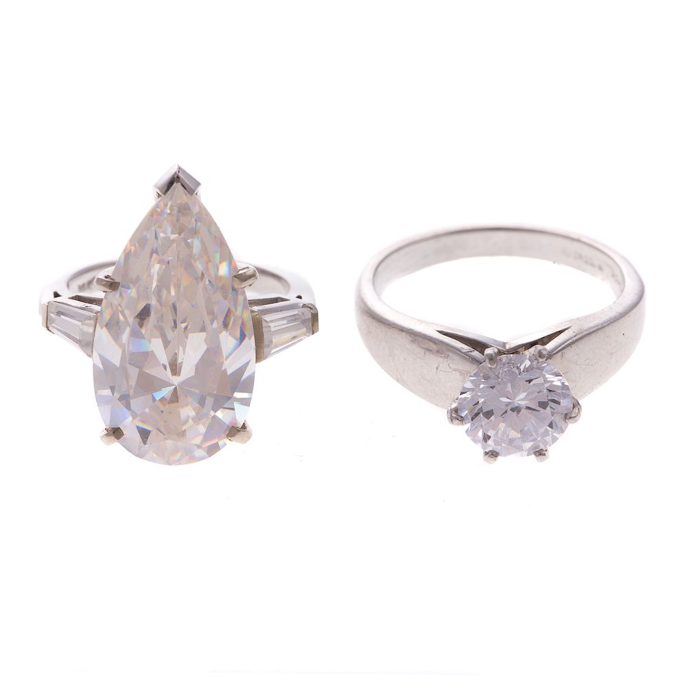 Appraisal: A Pair of CZ Engagement Rings in Gold Platinum Platinum