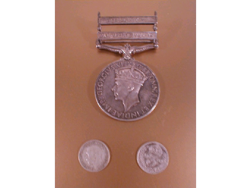 Appraisal: A George VI service medal with Malaya and Palestine -