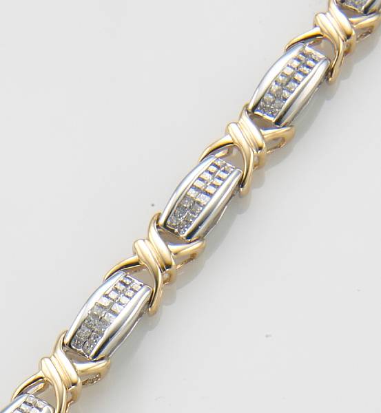 Appraisal: A diamond and k bicolor gold bracelet estimated total diamond