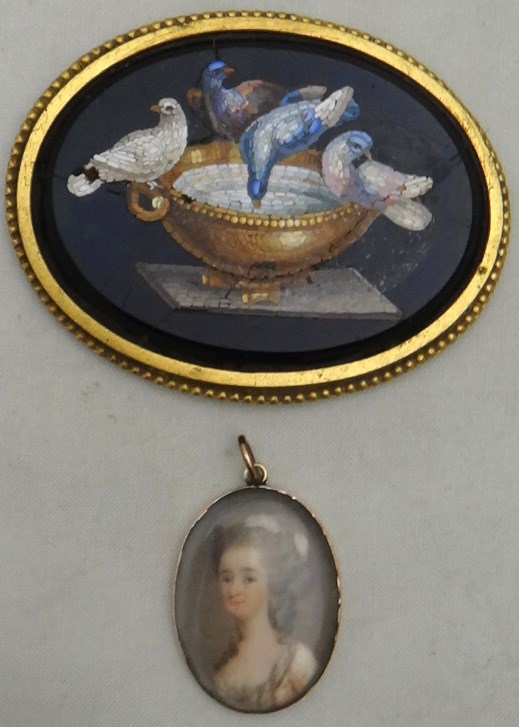 Appraisal: A gold mounted oval portrait miniature of a lady with