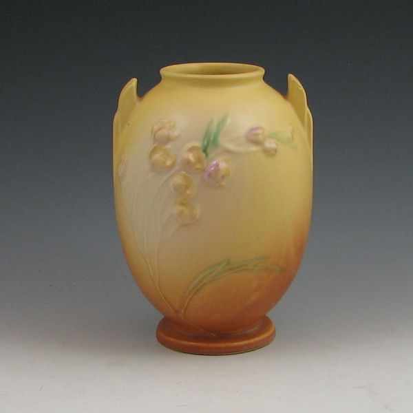 Appraisal: Roseville Ixia vase in yellow with original foil label Marked