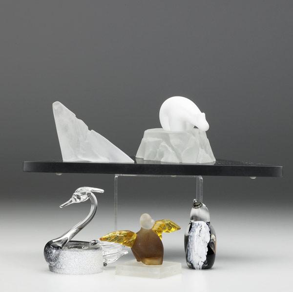 Appraisal: STUDIO GLASS Four figural sculptures polar bear on iceberg by