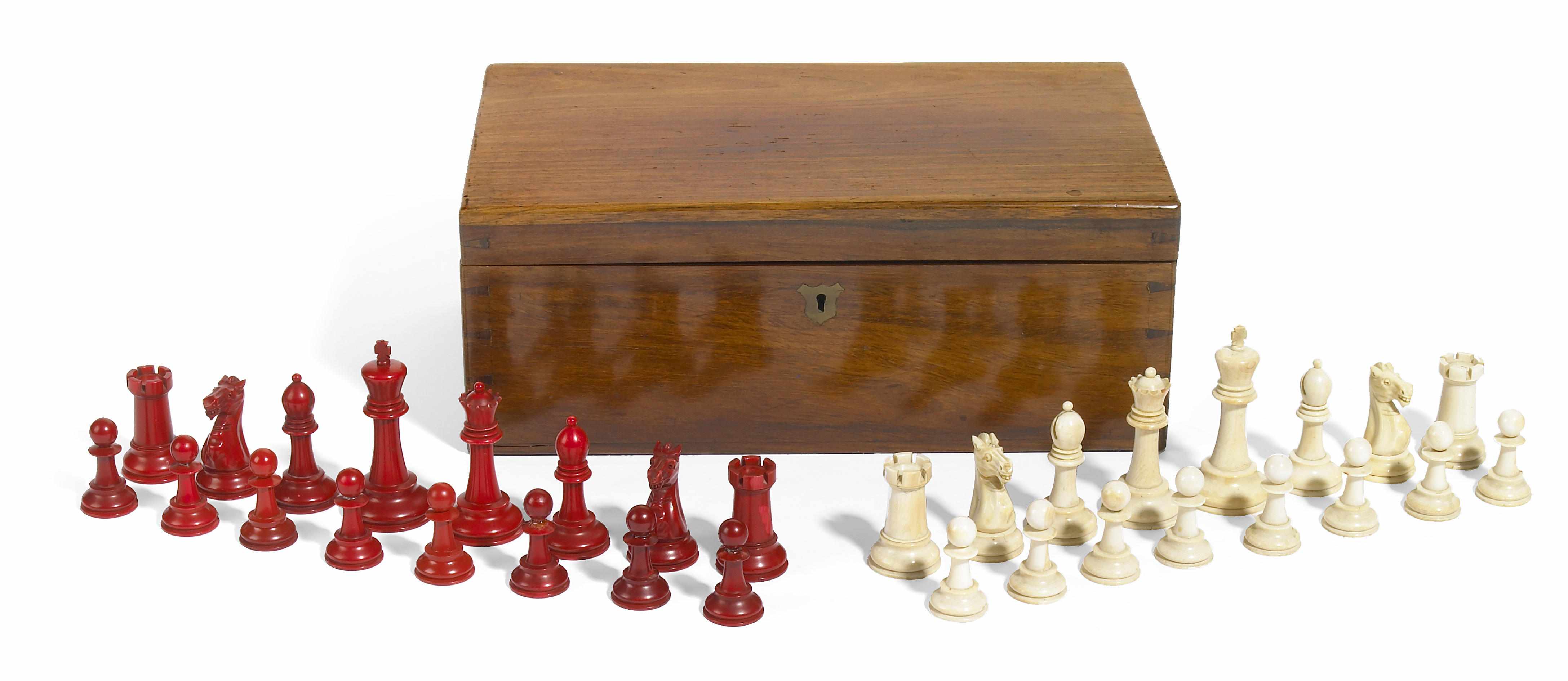 Appraisal: A Staunton carved natural and stained ivory chess set J