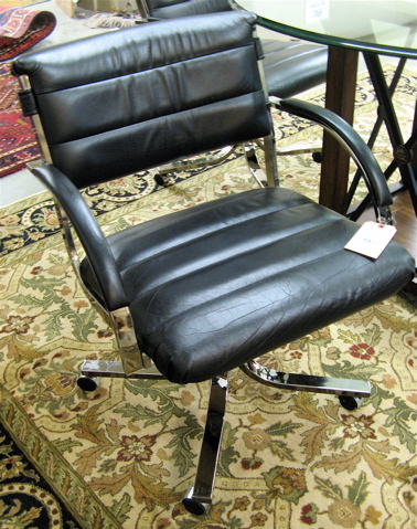 Appraisal: A SET OF FOUR OFFICE ARMCHAIRS Cal-Style Furniture Mfg Co