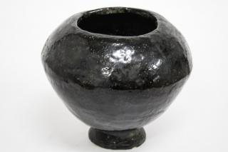 Appraisal: Suzan Elkin American b A black-glazed bulbous vase the underside