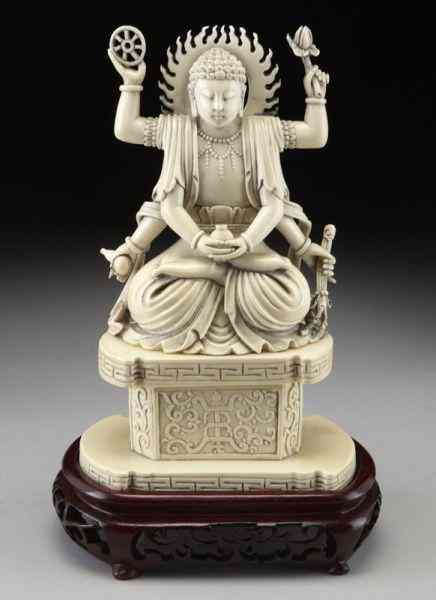 Appraisal: Chinese carved ivory six armed Buddha International buyers should note