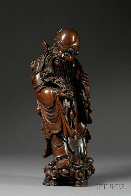 Appraisal: Large Wood Carving China th century figure of the god