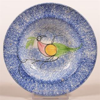 Appraisal: Blue Spatter Peafowl Pattern Small Sauce Dish Red yellow and