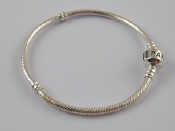 Appraisal: A white metal tests silver bracelet by Pandora approx cm