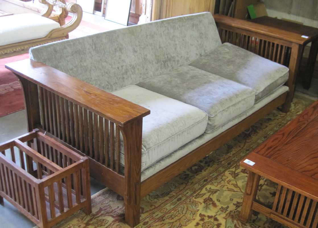 Appraisal: AMERICAN CRAFTSMAN STYLE OAK SOFA recent production having a three-cushion