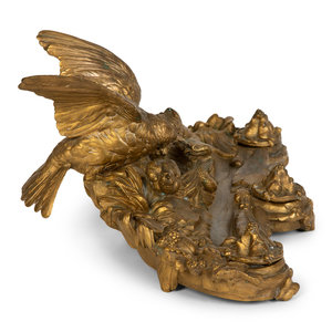 Appraisal: A Continental Gilt Bronze Inkwell with Bird and Nest in