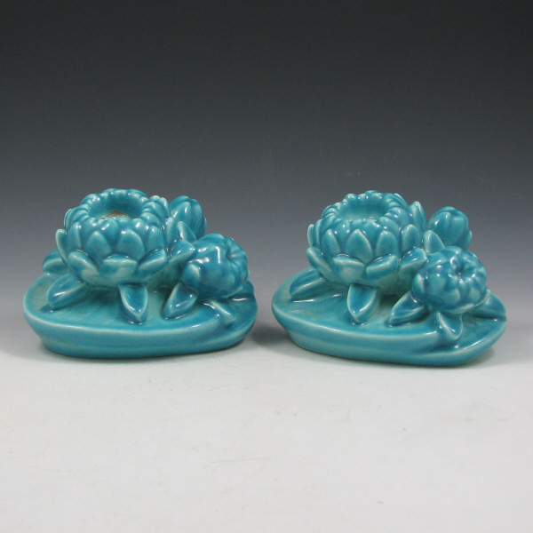 Appraisal: Pair of Rookwood water lily bookends from in blue high