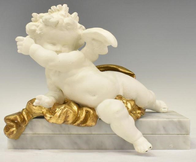 Appraisal: Parcel gilt painted spelter cherub the robust winged figure in