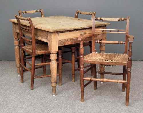 Appraisal: A Victorian stripped pine kitchen table fitted one drawer on