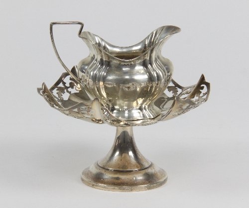 Appraisal: A silver tazza EV Sheffield with pierced border and a