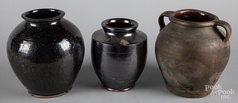 Appraisal: Three redware crocks th c tallest - h Three redware