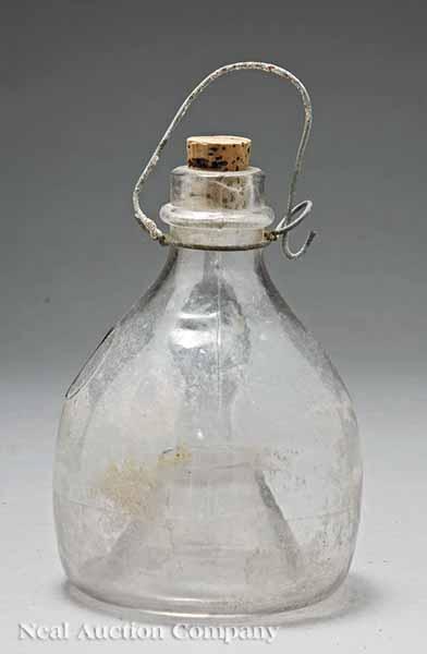 Appraisal: An American Clear Pressed Glass Flycatcher th c bottle form