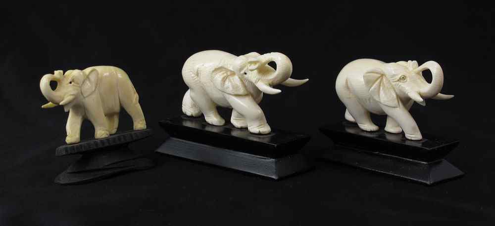 Appraisal: PIECE CARVED IVORY ELEPHANTS ON STANDS Largest measures overall ''